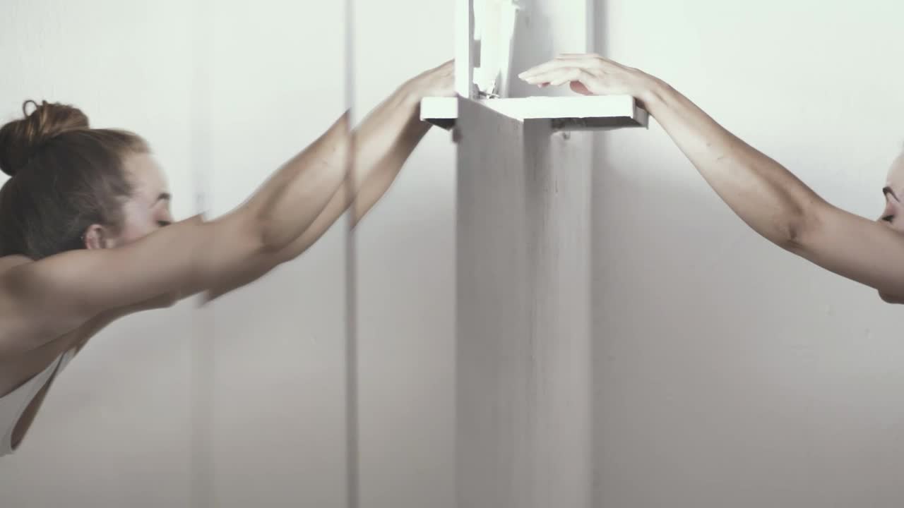 Stock Video Mirrored Image Of Woman Stretchin Animated Wallpaper