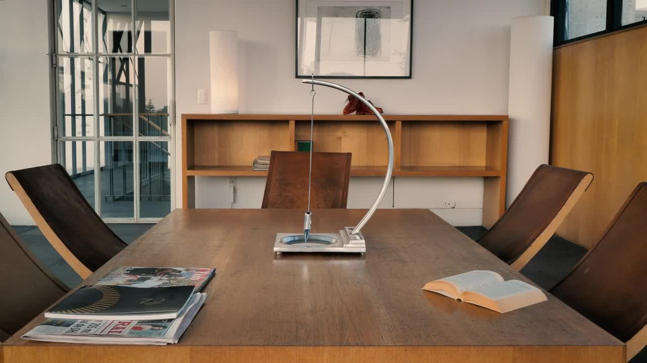 Stock Video Minimalist Room With Coffee Table With Books And Magazine Animated Wallpaper