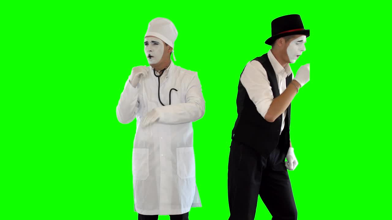 Stock Video Mimes Imitate Doctor And Sick Patient On Green Scree Animated Wallpaper