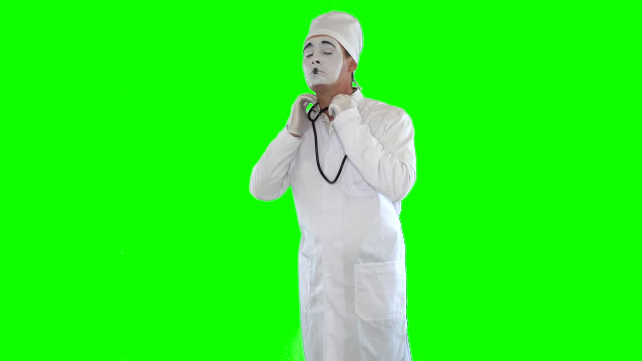 Stock Video Mime Imitates Doctor With Stethoscope On Green Scree Animated Wallpaper