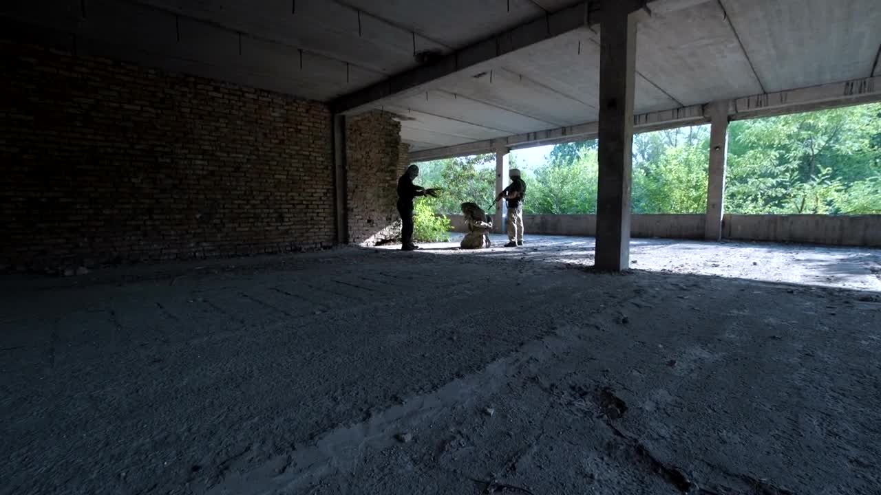 Stock Video Military Men Releasing A Hostage Form Terrorist Animated Wallpaper