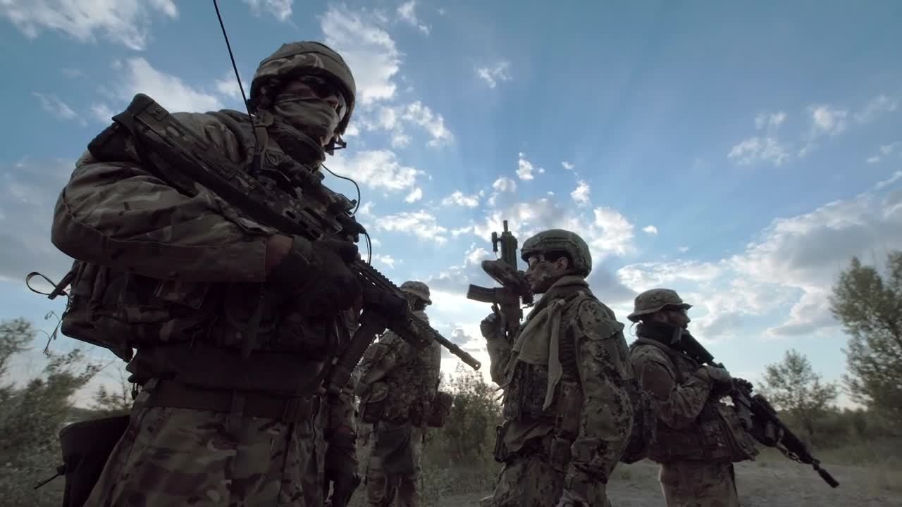 Stock Video Military Men Posing Outdoor Animated Wallpaper