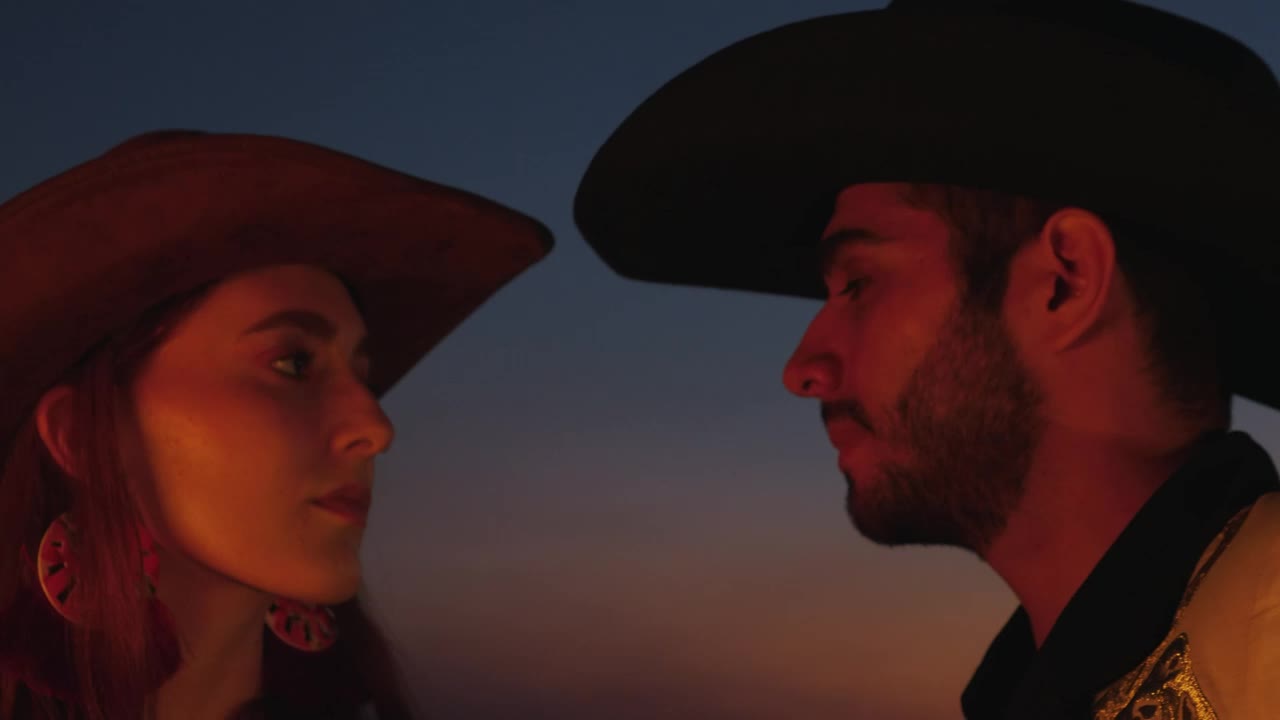 Stock Video Mexican Style Couple Looking At Each Other At Sunse Animated Wallpaper