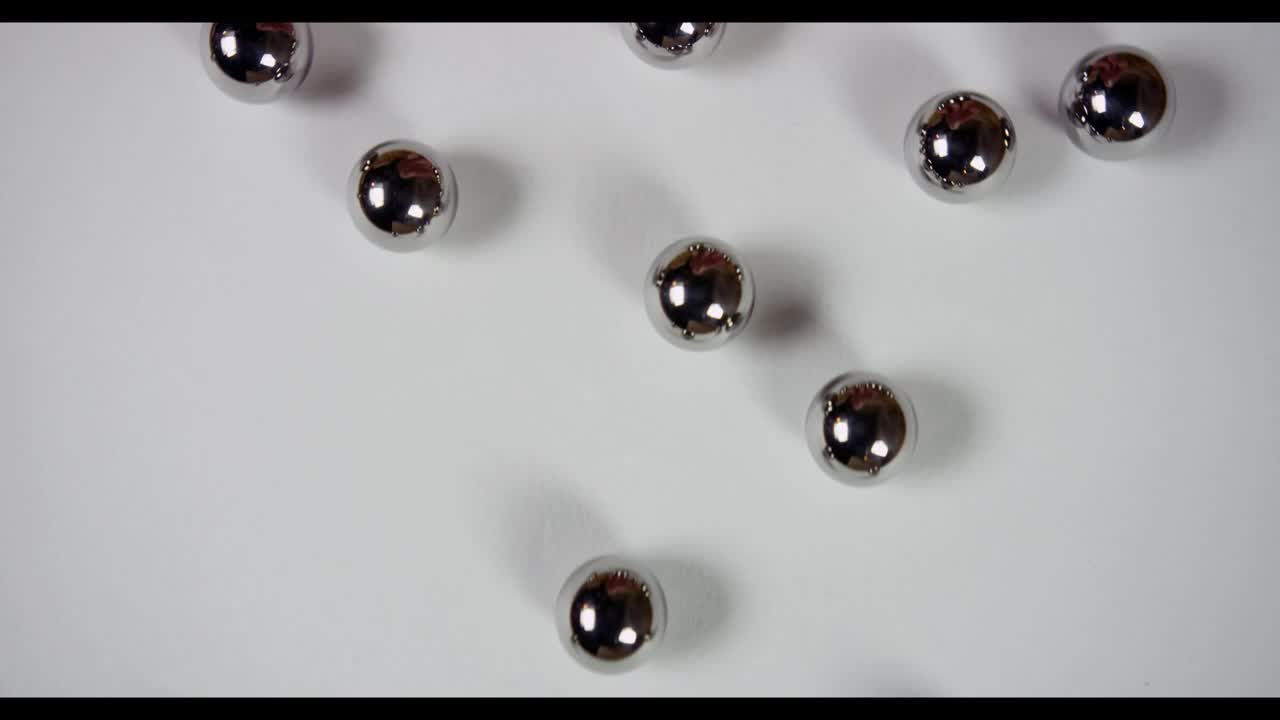 Stock Video Metal Pellets Roll From Bottom To To Animated Wallpaper