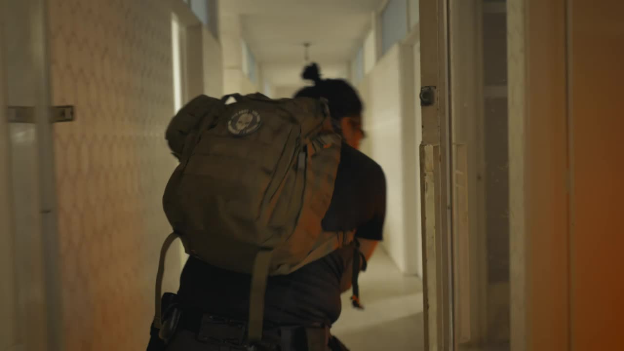 Stock Video Mercenary Looking For Zombies In An Abandoned Buildin Animated Wallpaper