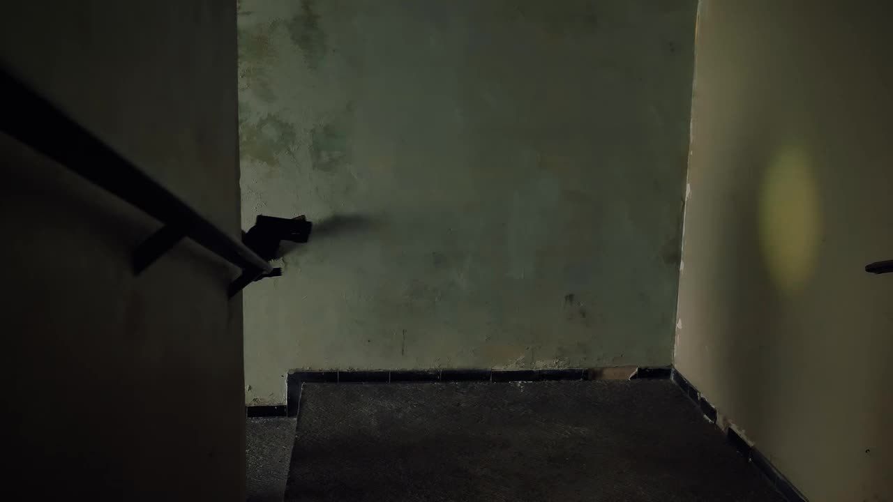 Stock Video Mercenary Going Up The Stairs Aiming His Gu Animated Wallpaper