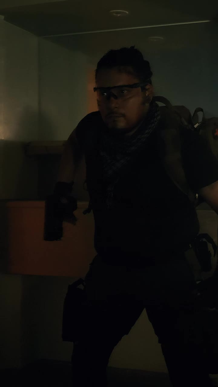 Stock Video Mercenary Draws His Gun In An Abandoned Hospita Animated Wallpaper