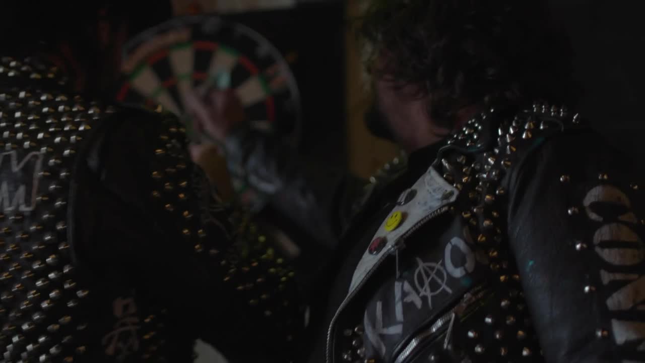 Stock Video Men Remove Darts From A Boar Animated Wallpaper