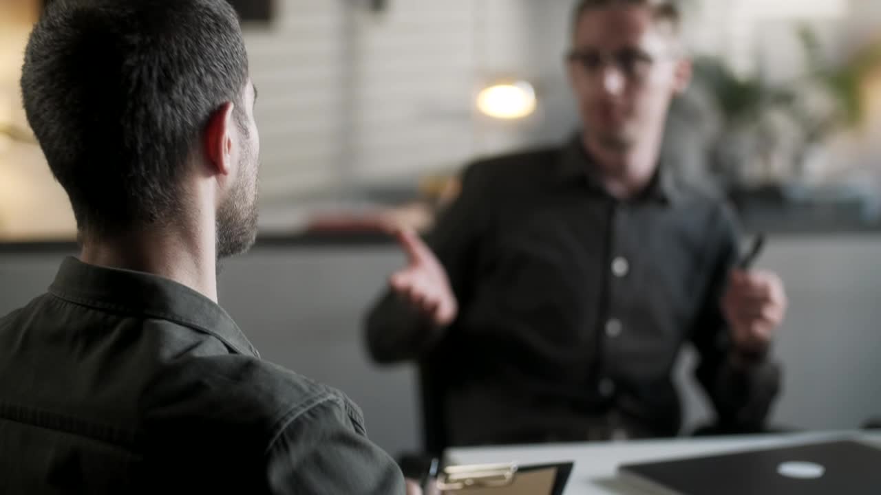 Stock Video Men In Black Shirts Shake Hands At Business Meetn Animated Wallpaper