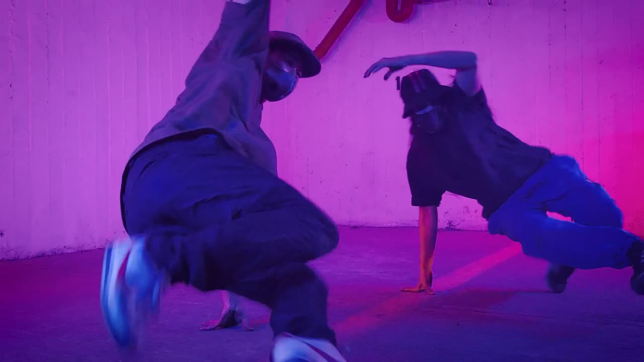 Stock Video Men Dancing Break Dance Taking Care Of Themselves With Animated Wallpaper