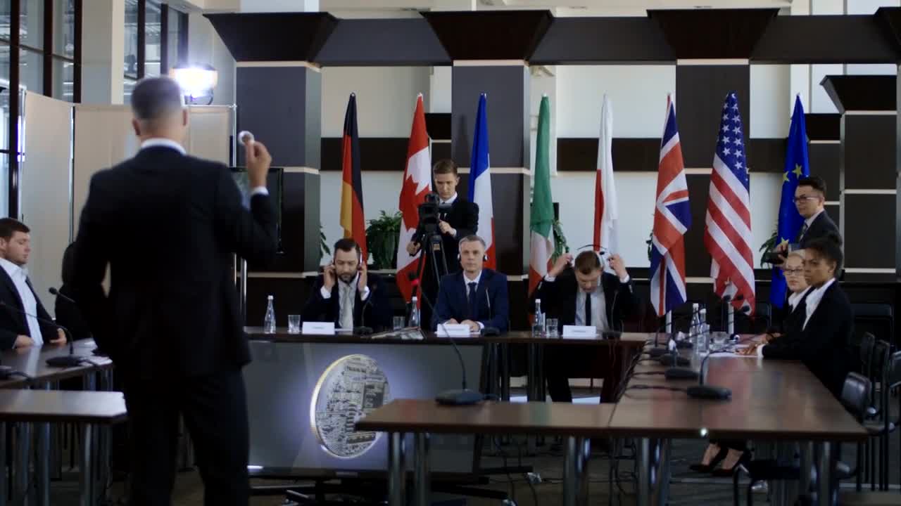 Stock Video Members Of The Conference Discussing Bitcoi Animated Wallpaper