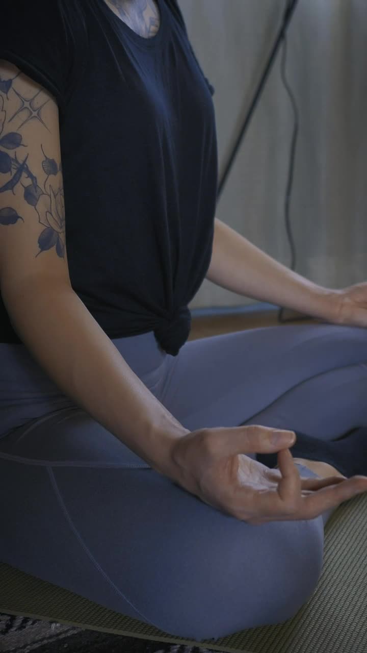 Stock Video Meditating Peacefully In Yoga Pose At Hom Animated Wallpaper