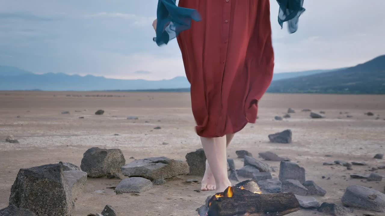 Stock Video Meditating In The Middle Of A Desert With A Campfir Animated Wallpaper