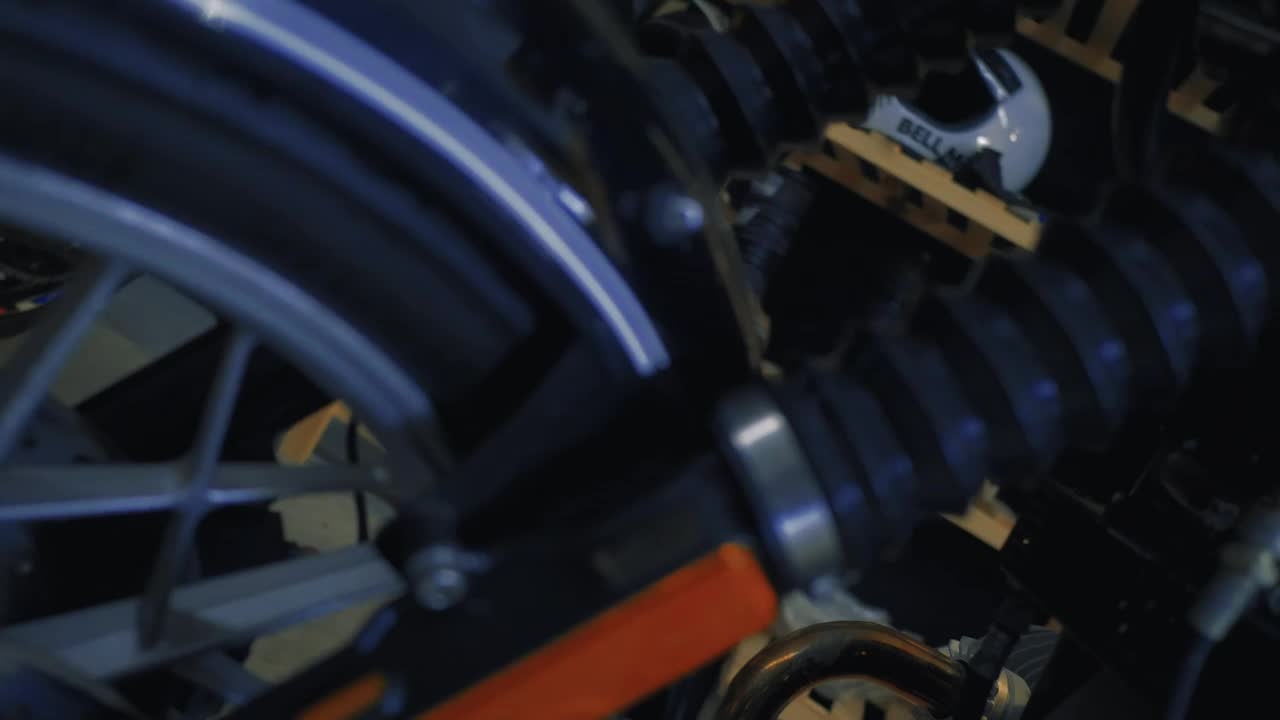 Stock Video Mechanisms Of A Motorcycle In A Worksho Animated Wallpaper