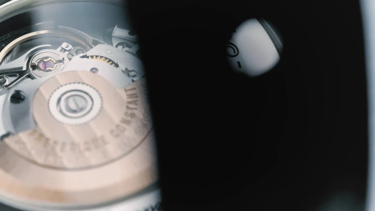 Stock Video Mechanism Of A Watch Through A Glas Animated Wallpaper