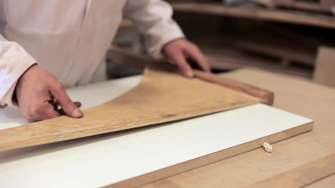 Stock Video Measuring Wood For Cuttin Animated Wallpaper