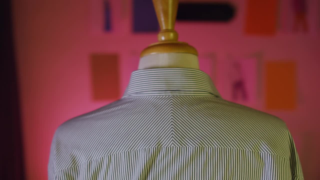 Stock Video Measuring A Shirt In A Sho Animated Wallpaper
