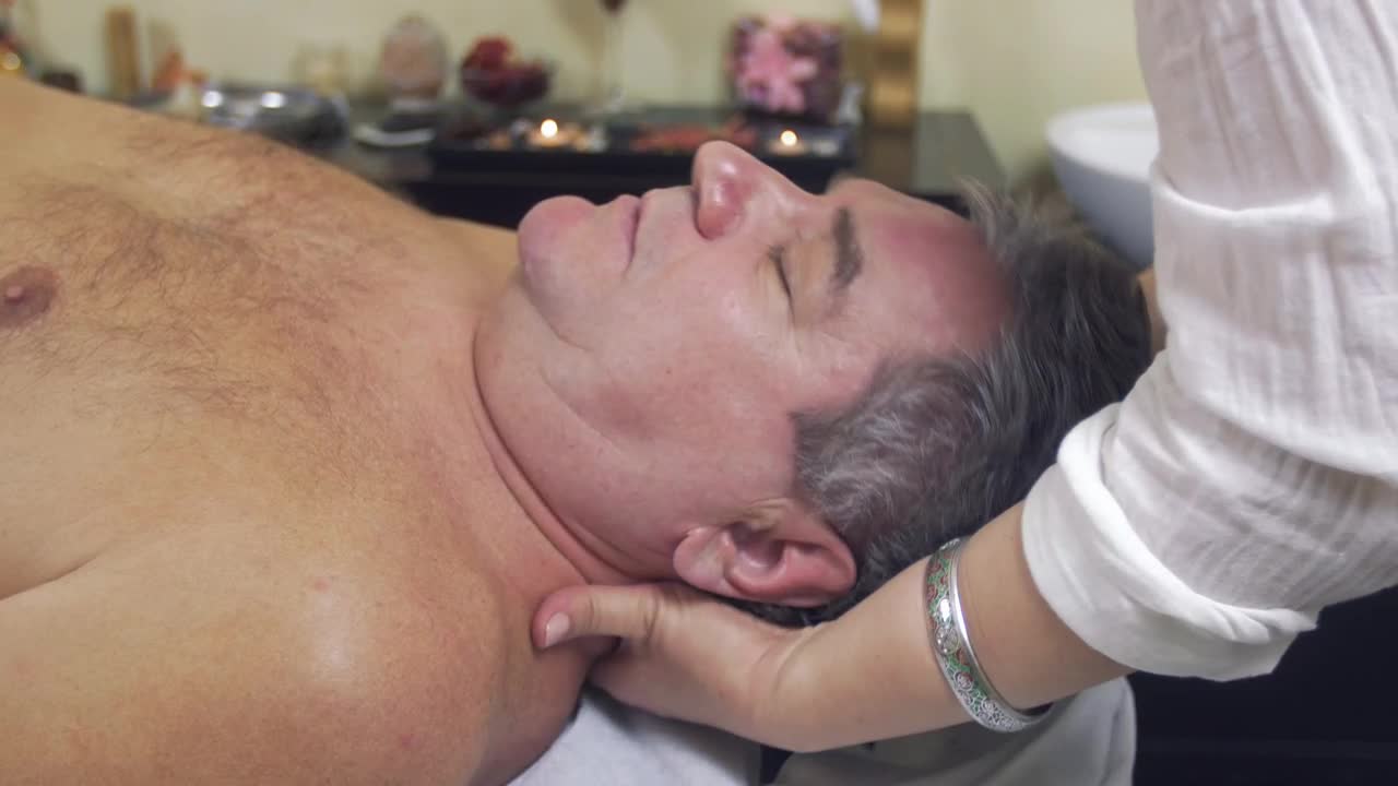 Stock Video Masseuse Massaging The Back Of The Nec Animated Wallpaper