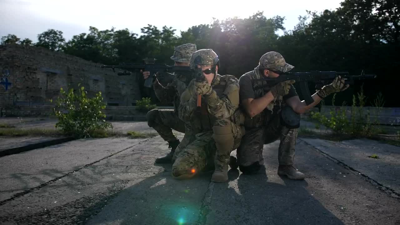 Stock Video Marines Aiming Their Weapon Animated Wallpaper