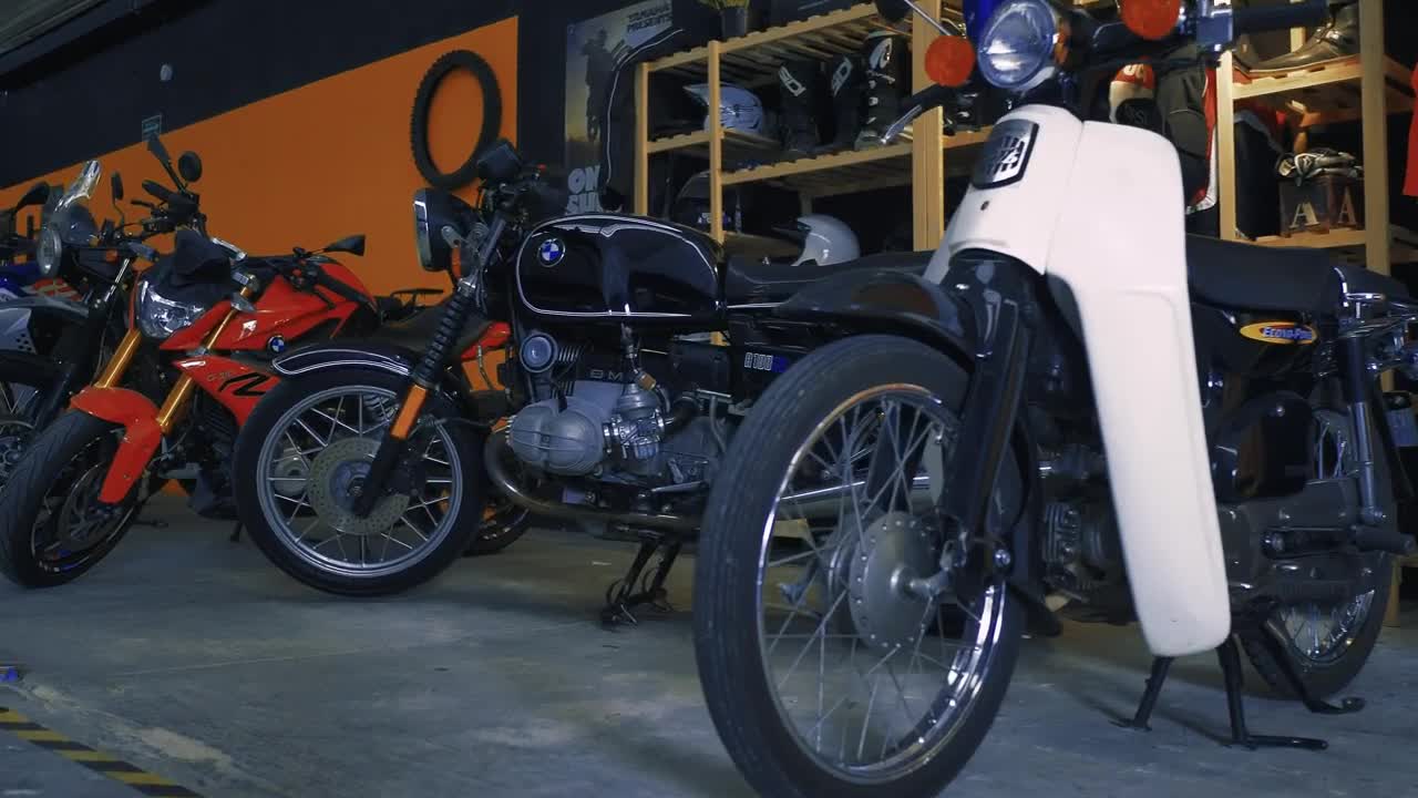 Stock Video Many Motorcycles Parked In A Row In A Garag Animated Wallpaper