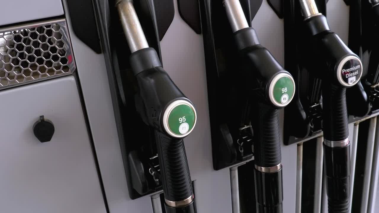 Stock Video Mans Hand Taking The Fuel Nozzle At The Gas Statio Animated Wallpaper