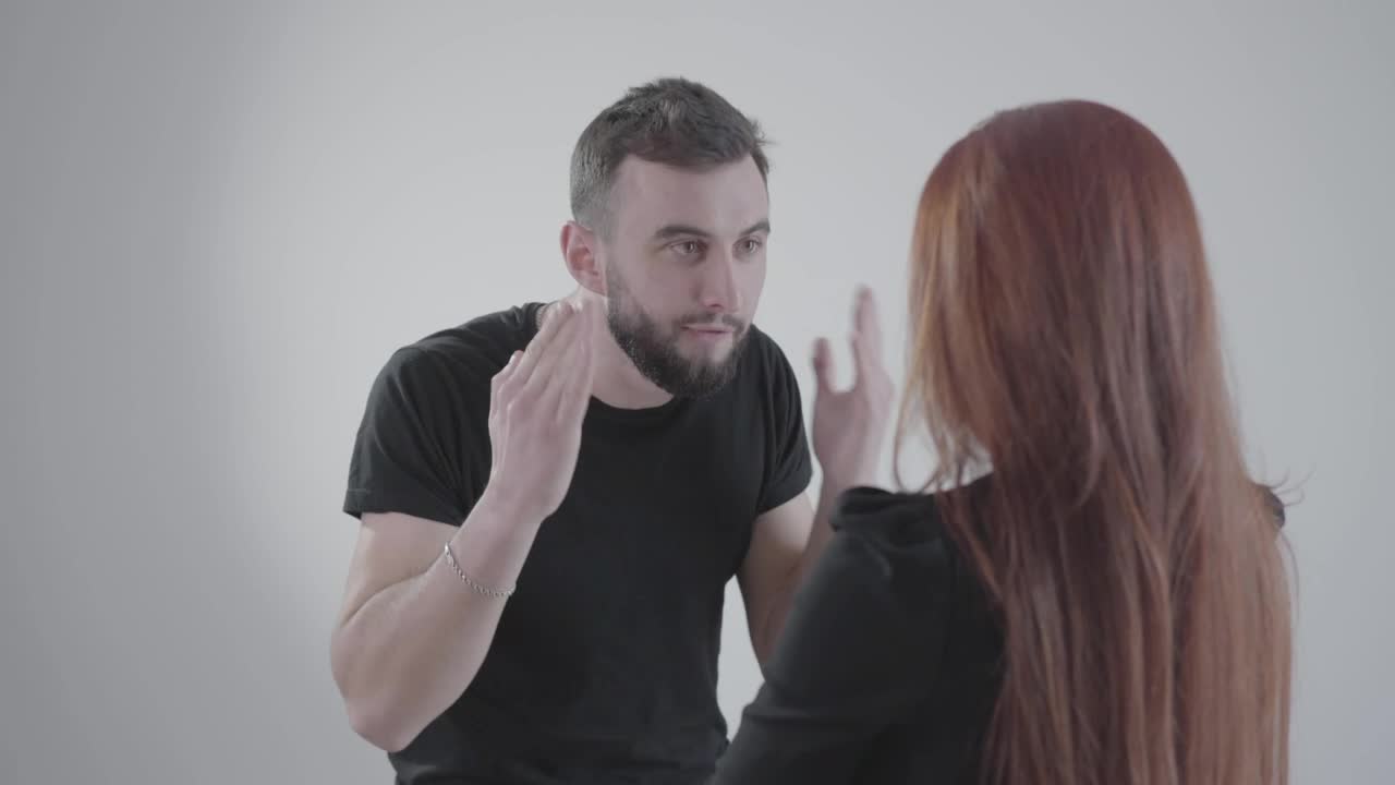 Stock Video Man Yells At Woman And Gestures Angrily On White Backgroun Animated Wallpaper