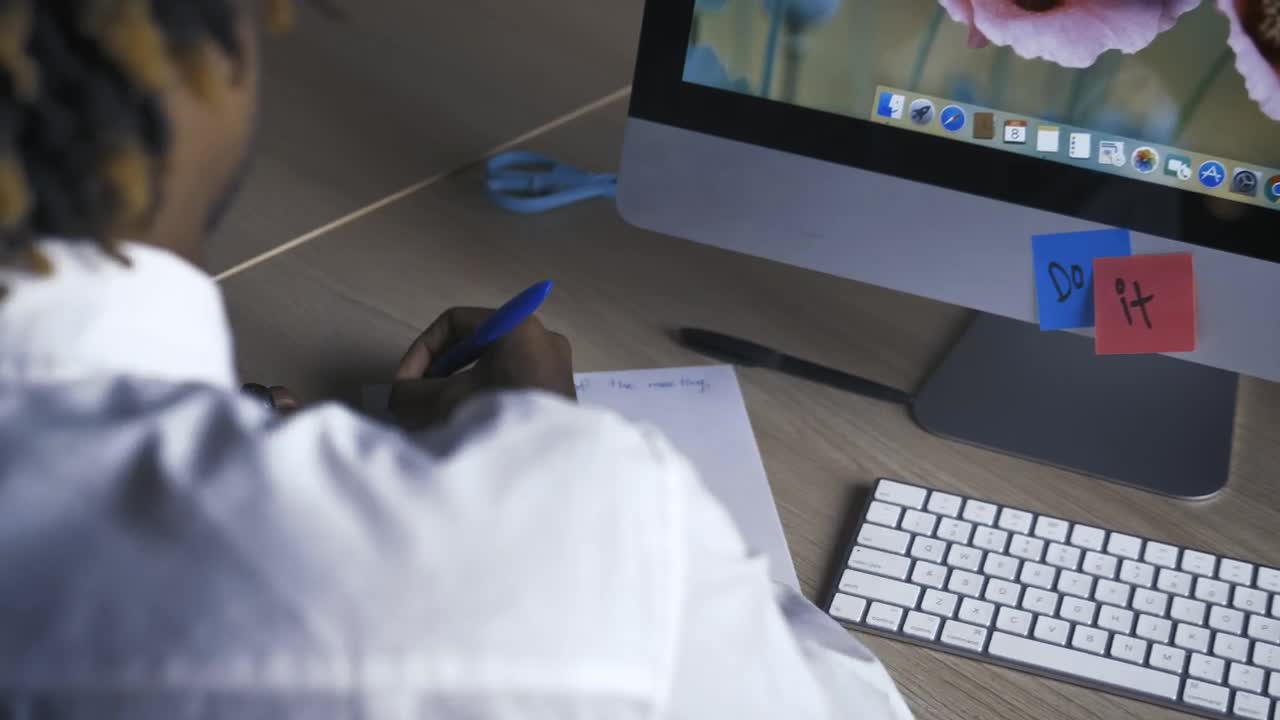 Stock Video Man Writing With Pen On A Sheet In His Offic Animated Wallpaper