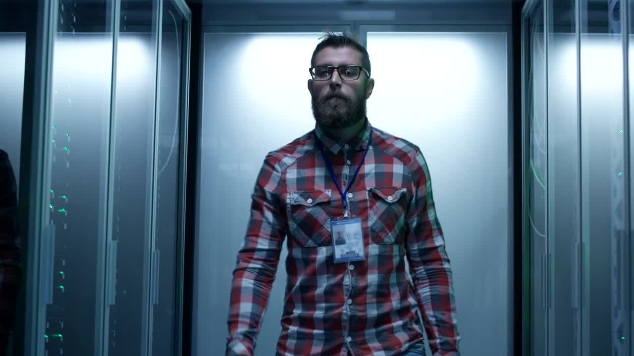 Stock Video Man Working With Data Center Compute Animated Wallpaper