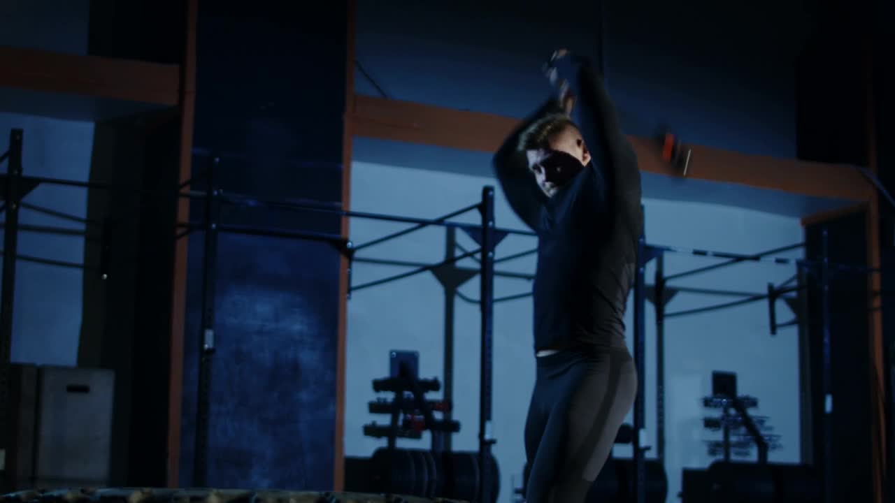 Stock Video Man Working Out With Sledgehamme Animated Wallpaper