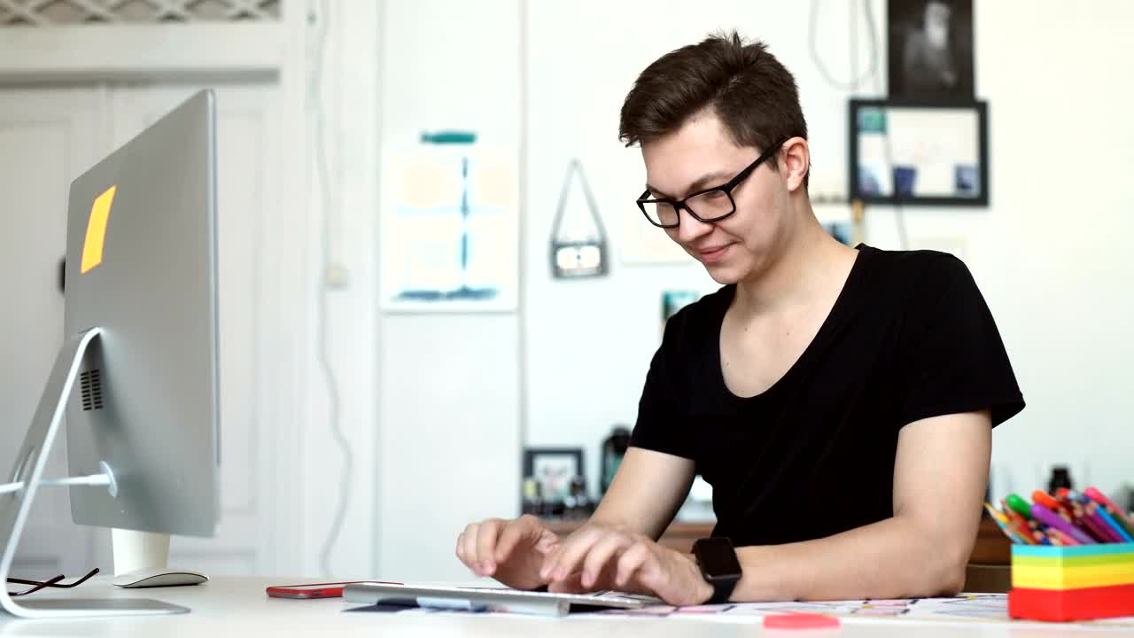 Stock Video Man Working From Home On His Compute Animated Wallpaper