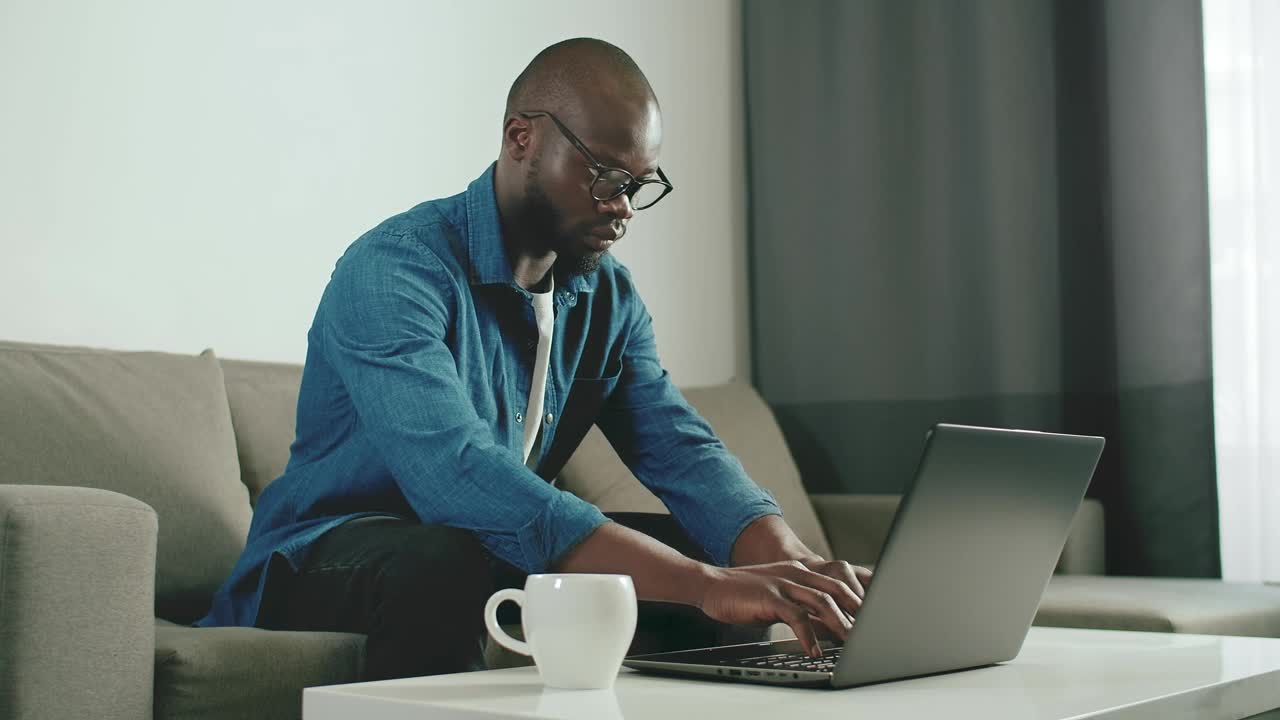 Stock Video Man Working From Home In His Living Roo Animated Wallpaper