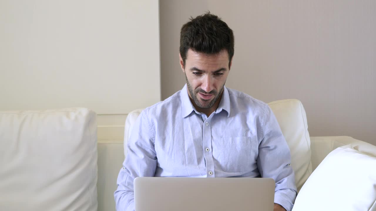 Stock Video Man Working At Home On A Compute Animated Wallpaper
