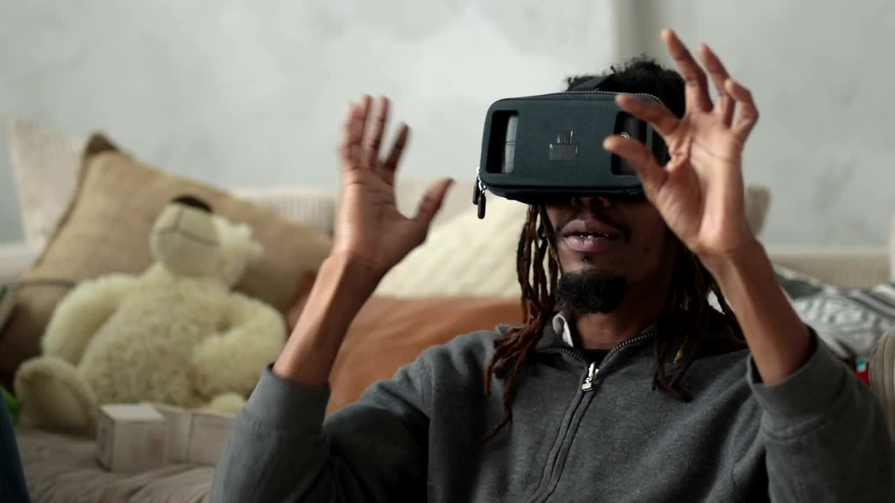 Stock Video Man With Vr Glasses Doing Commands With His Hand Animated Wallpaper
