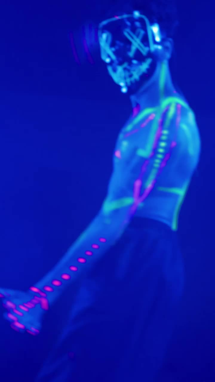 Stock Video Man With Neon Mask Dancing With Party Ligh Animated Wallpaper