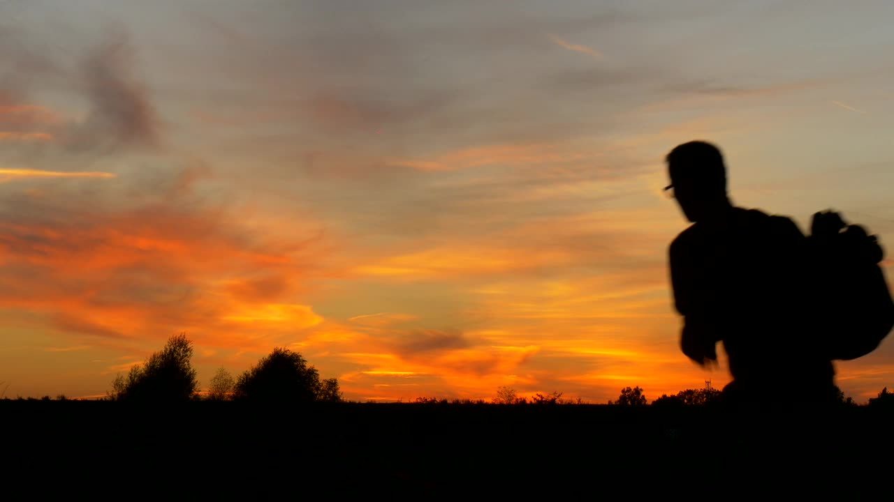 Stock Video Man With Laptop Silhouette In The Sunse Animated Wallpaper