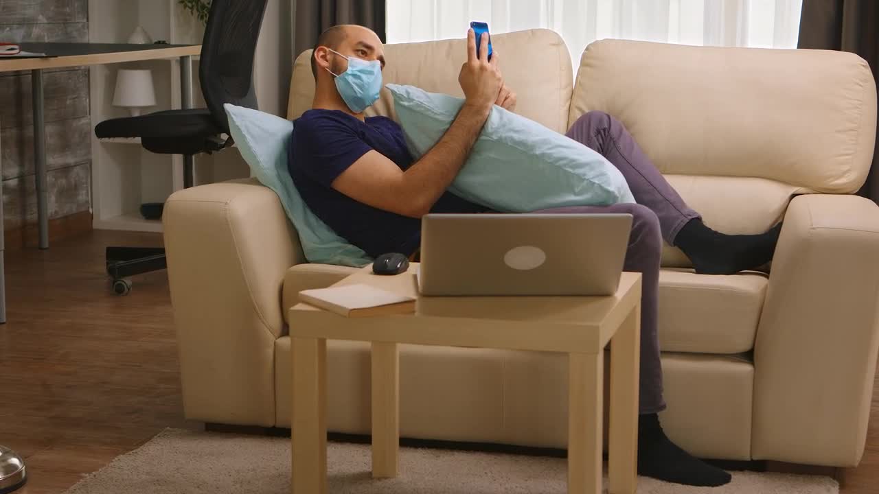 Stock Video Man With Coronavirus Chats On Social Media From Couc Animated Wallpaper