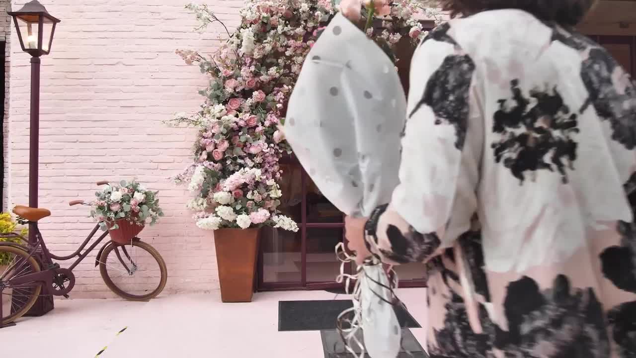 Stock Video Man With A Bouquet Of Flowers Waiting For Someon Animated Wallpaper