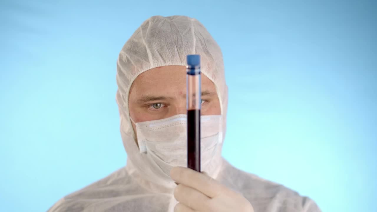 Stock Video Man Wearing Full Ppe While Holding A Via Animated Wallpaper