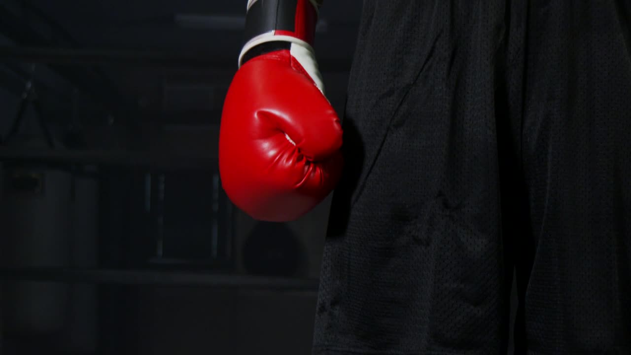 Stock Video Man Wearing Boxing Glove Animated Wallpaper