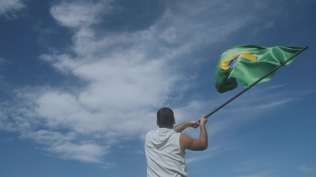 Stock Video Man Waving The Flag Of Brazi Animated Wallpaper