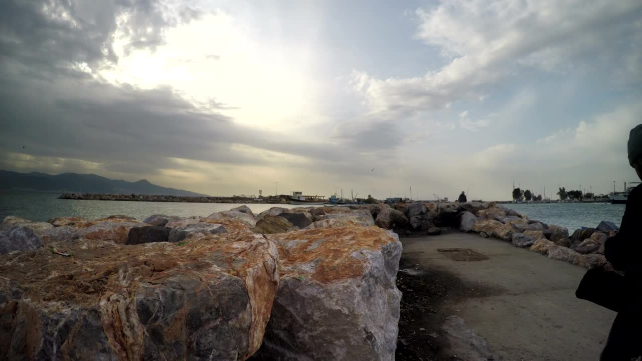 Stock Video Man Walks Next To His Bike At The Pie Animated Wallpaper