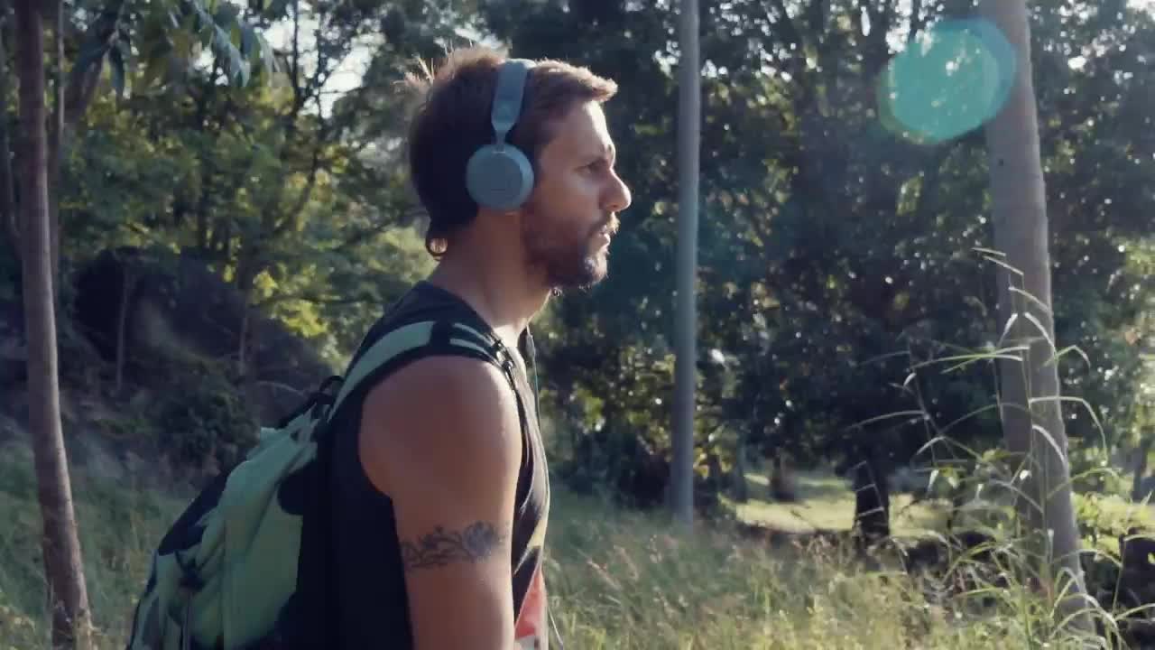 Stock Video Man Walking With Music In Natur Animated Wallpaper