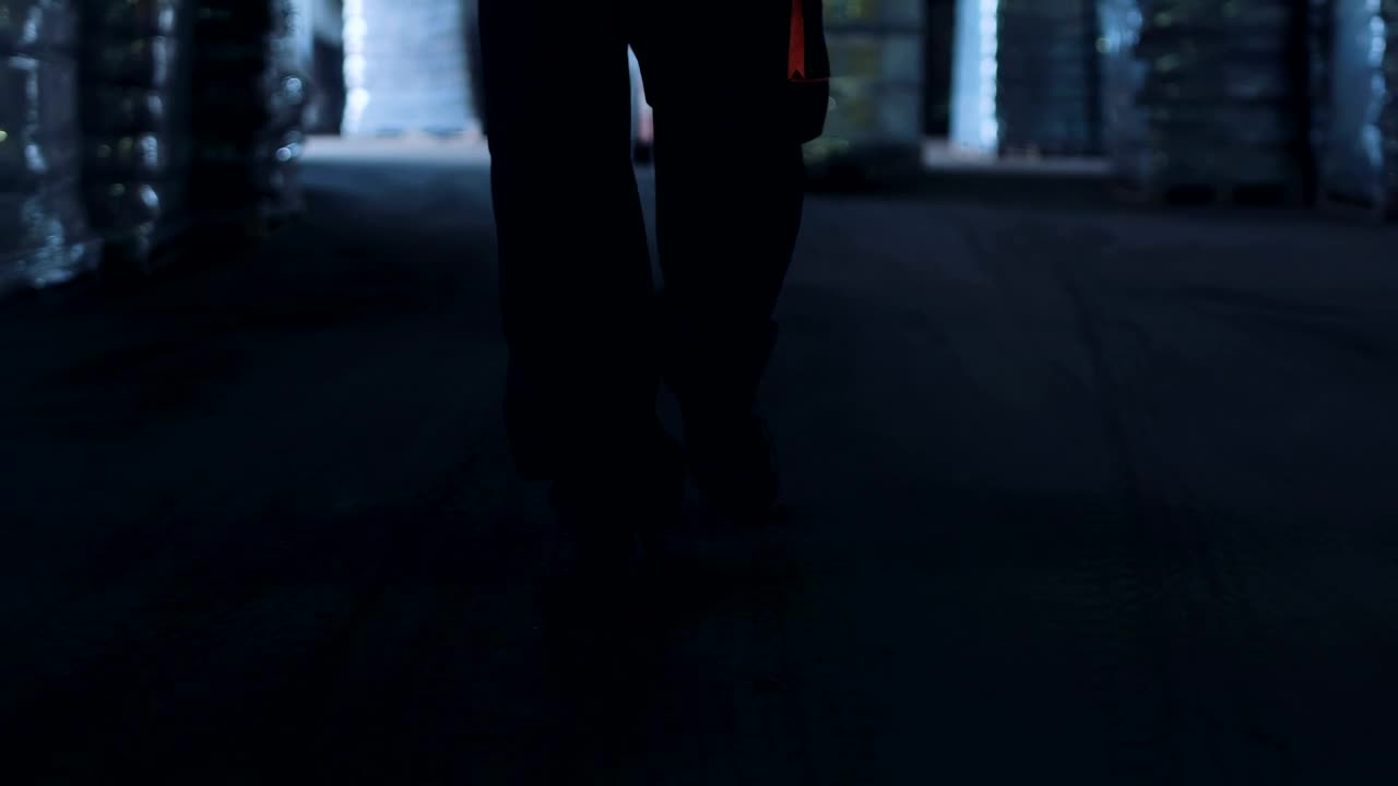 Stock Video Man Walking Through The Warehous Animated Wallpaper