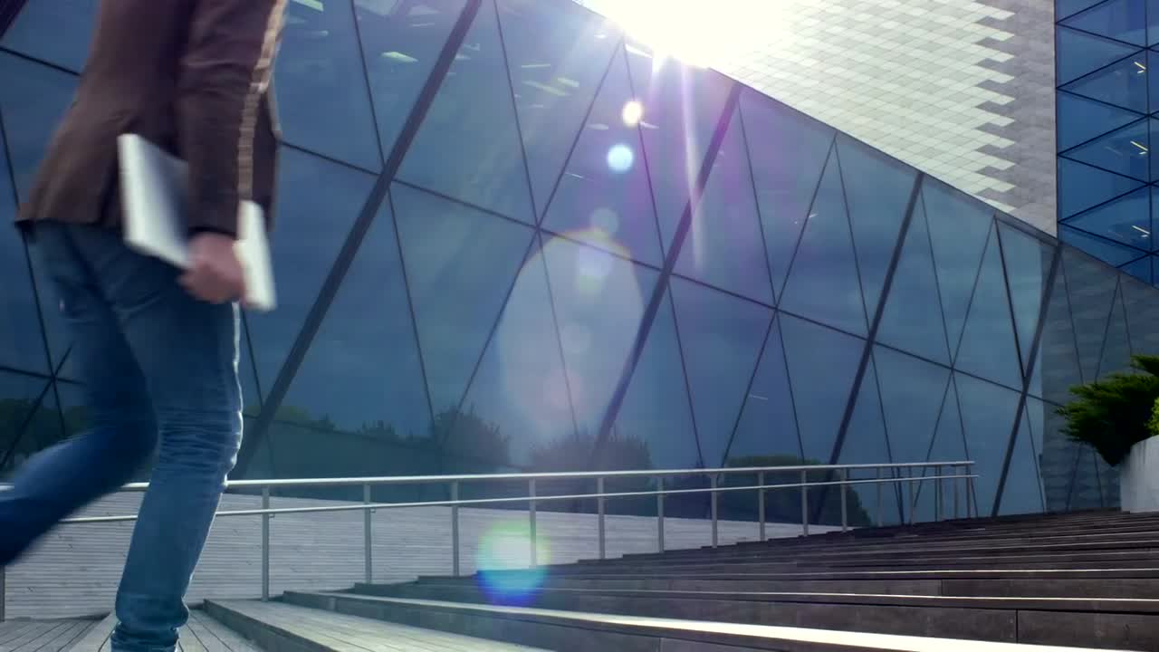 Stock Video Man Walking Into Office Buildin Animated Wallpaper