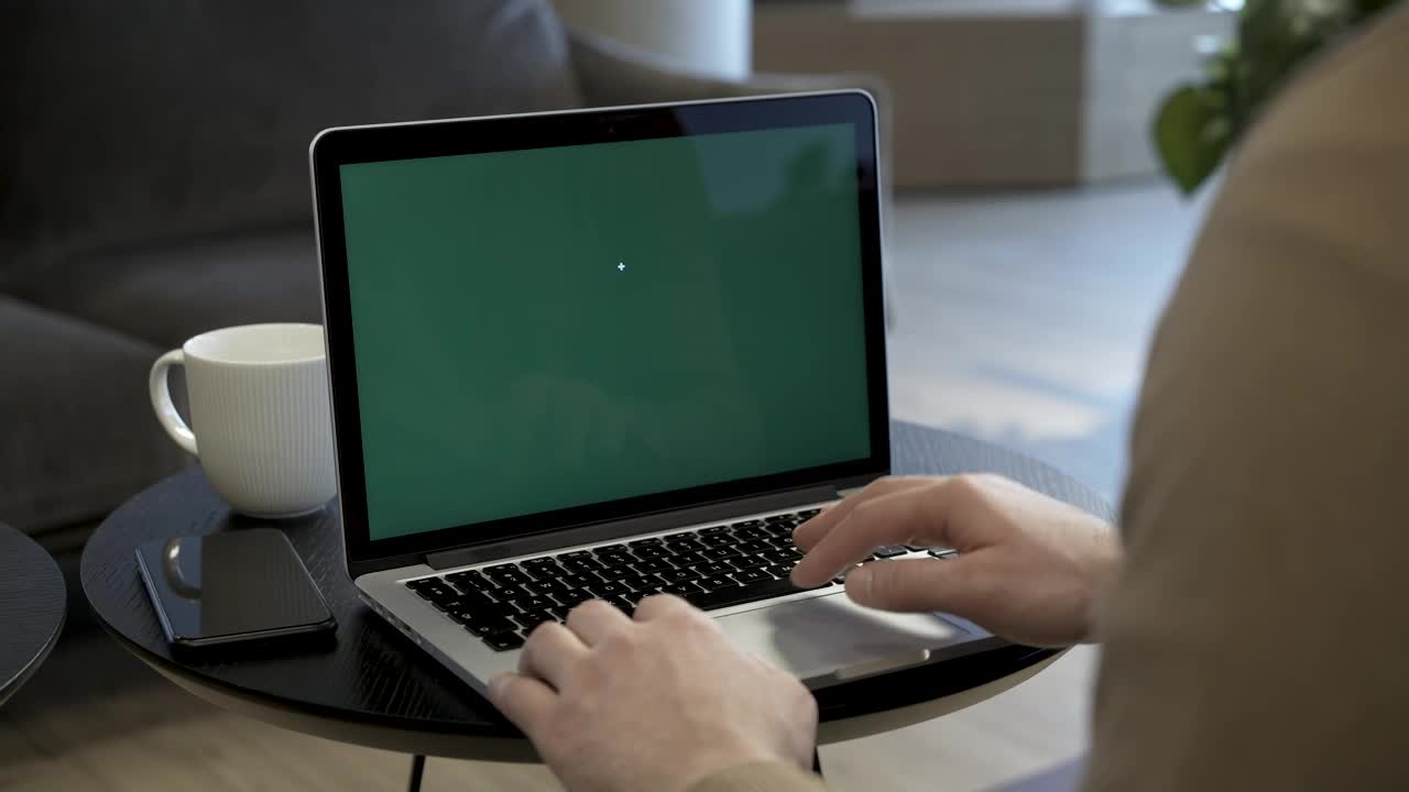 Stock Video Man Using The Touchpad On A Lapto Animated Wallpaper