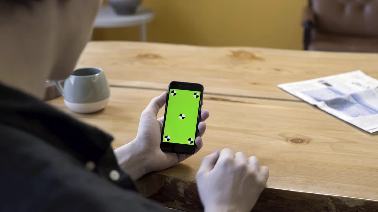 Stock Video Man Using An Older Smartphon Animated Wallpaper