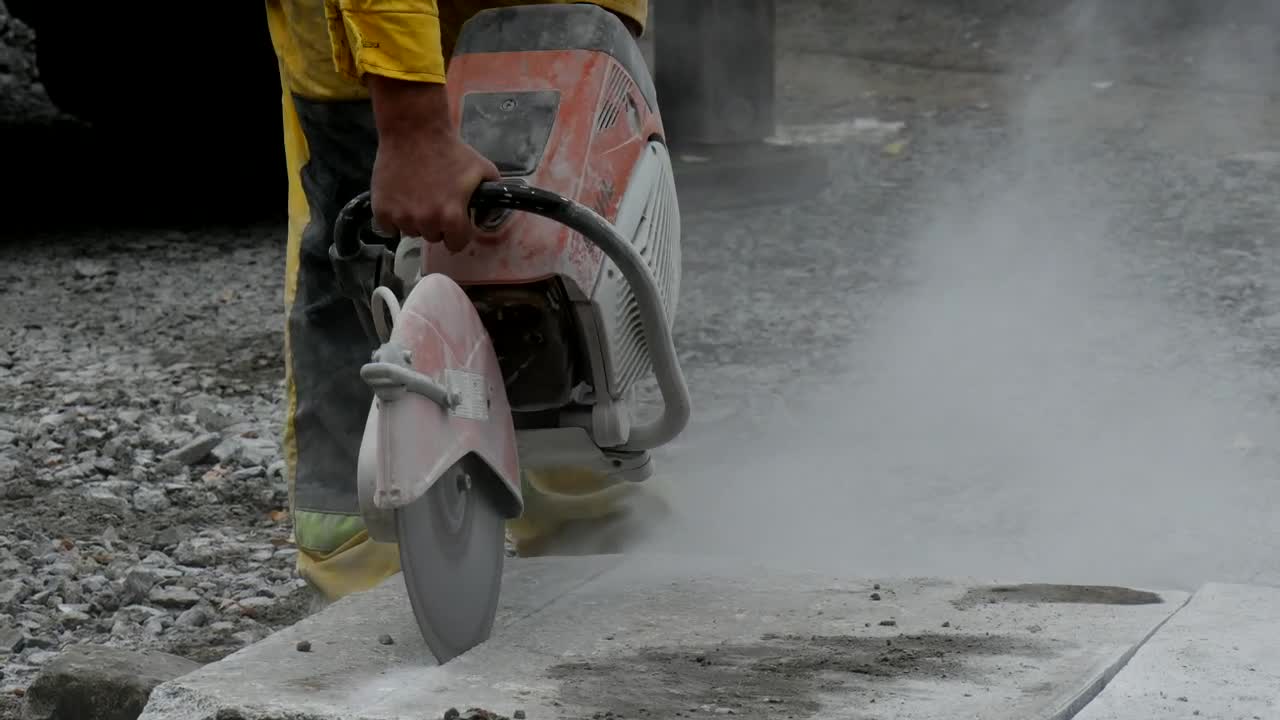 Stock Video Man Using An Industrial Cutte Animated Wallpaper