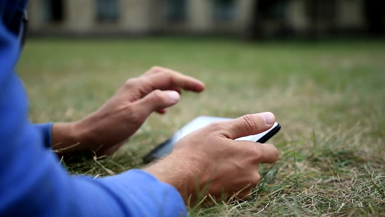 Stock Video Man Using A Small Table Animated Wallpaper