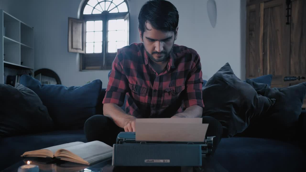 Stock Video Man Typing On A Typewriter Sitting In A Roo Animated Wallpaper