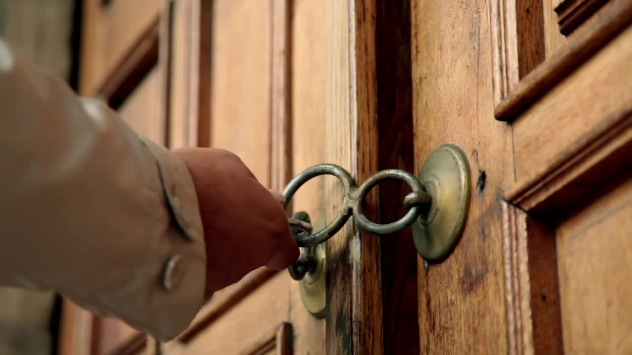 Stock Video Man Tries To Open A Padlocked Wooden Doo Animated Wallpaper